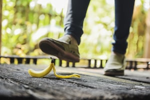 Man stepping on a banana